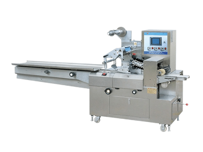 Machine d'emballage en continu pour la mise en sachets de type « oreiller »