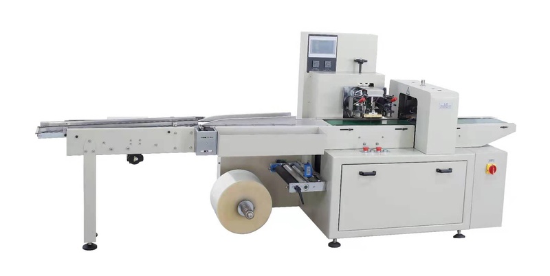 Machine d'emballage sous film continu jc250
